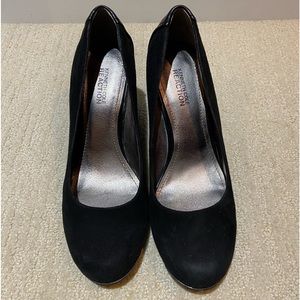 Black suede and leather wedge.